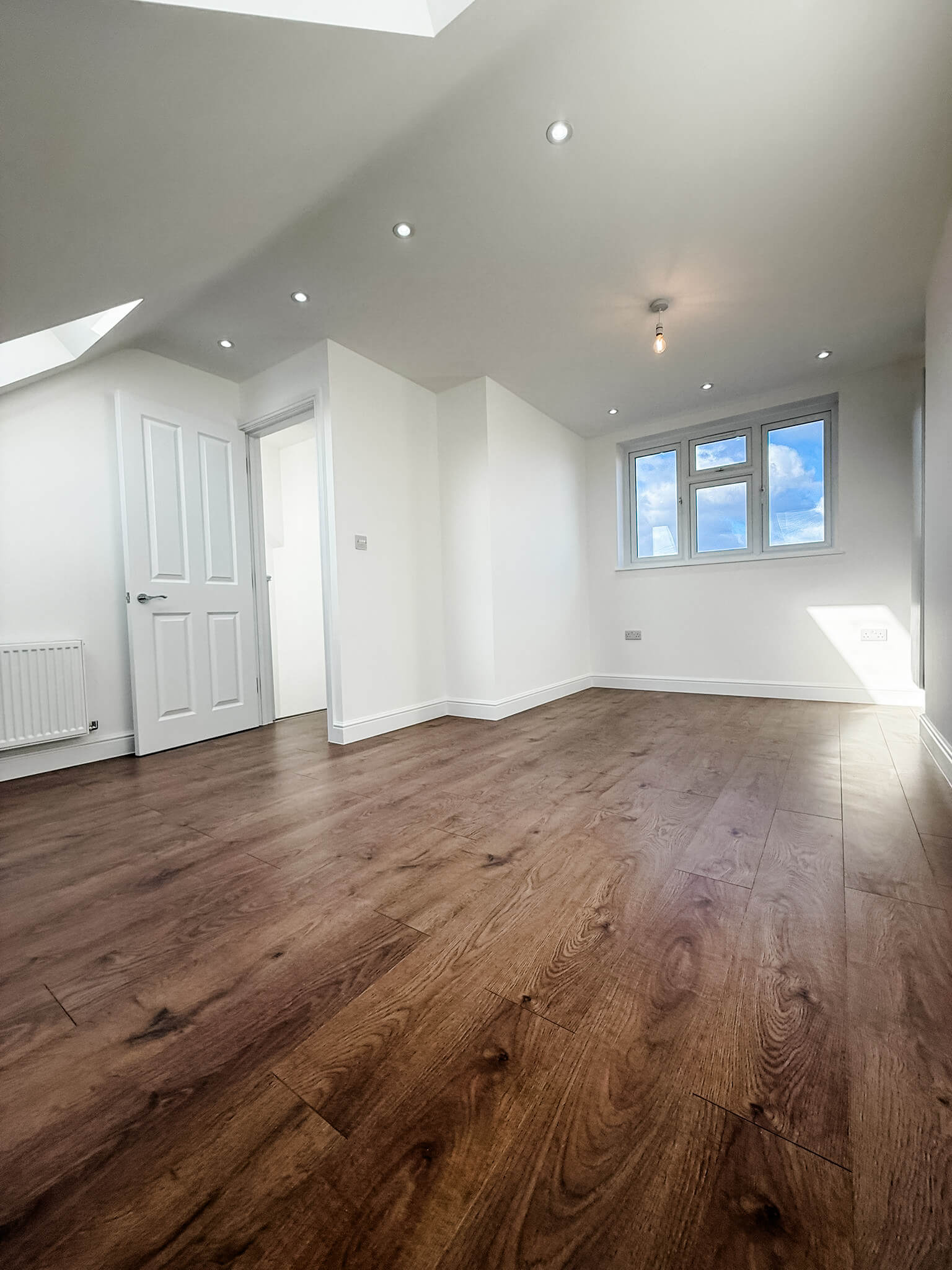 Loft interior with dormer extension in Harold Wood